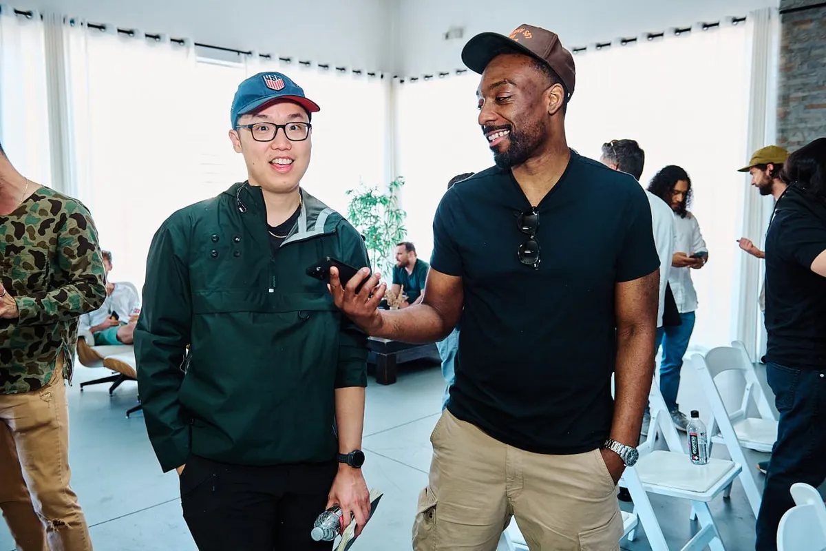 Attendees relaxing and chatting at the venue