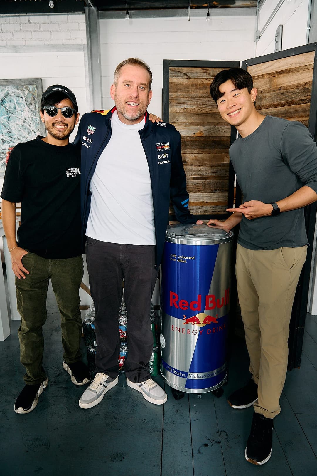 Friends posing with the Red Bull cooler at the OpenClaw LA Meetup #3
