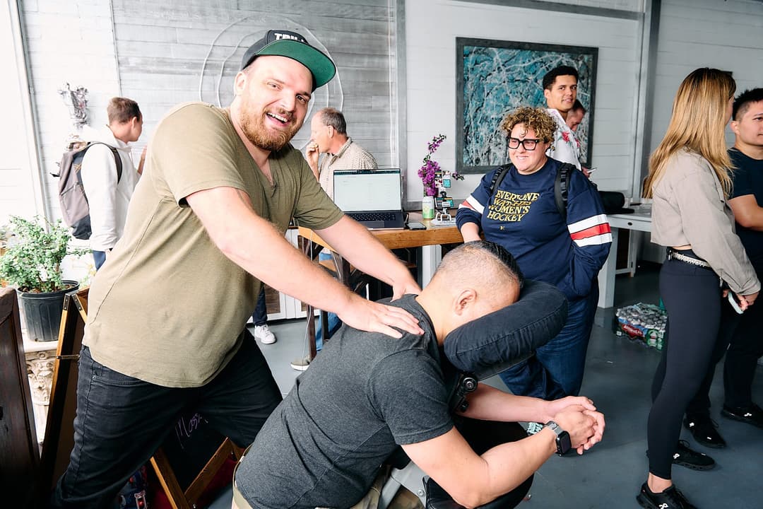 Trillium giving a complimentary massage at the back of the venue