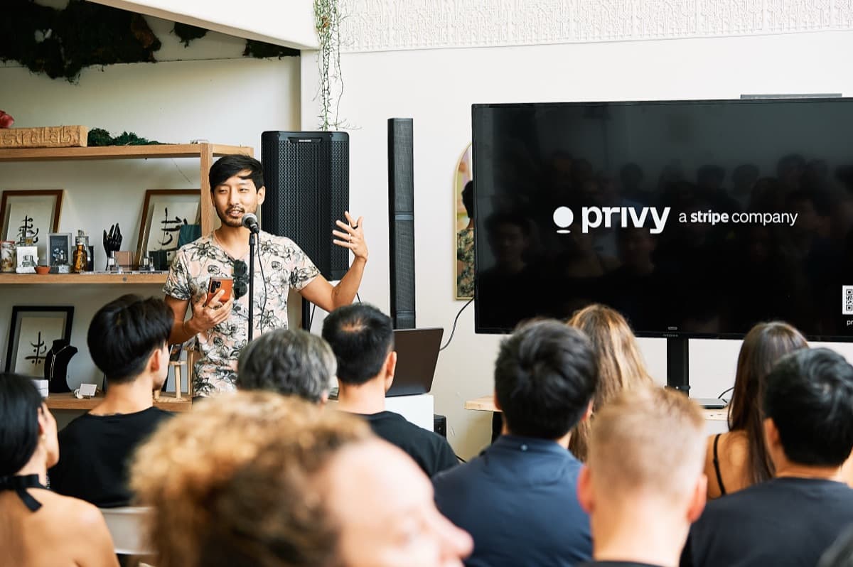 Speaker presenting with Privy slide